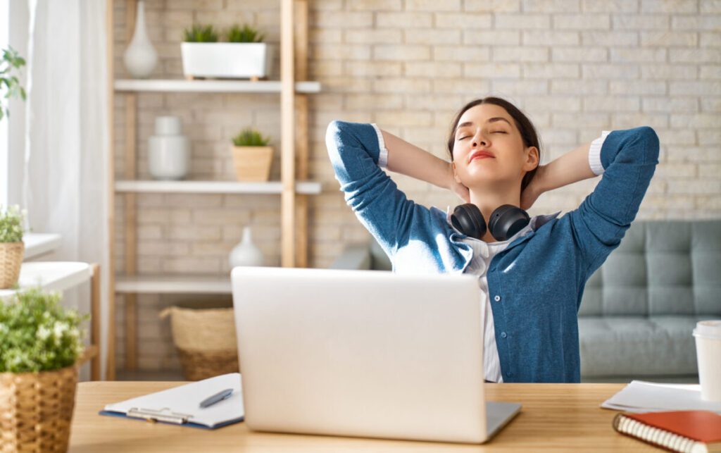 woman working on a laptop at home.